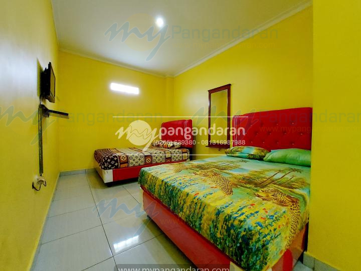  Tampilan Kamar Tidur Pondok Andika Pangandaran di faslitasi AC, Kamar Mandi dan double bed ukuran 140x200