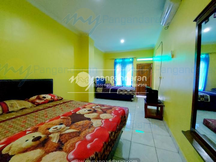  Tampilan Kamar Tidur Pondok Andika Pangandaran di faslitasi AC, Kamar Mandi dan double bed ukuran 140x200